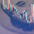 What is the difference between spot price and buy price of gold?